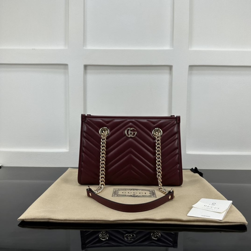 G*u*i top handle bags